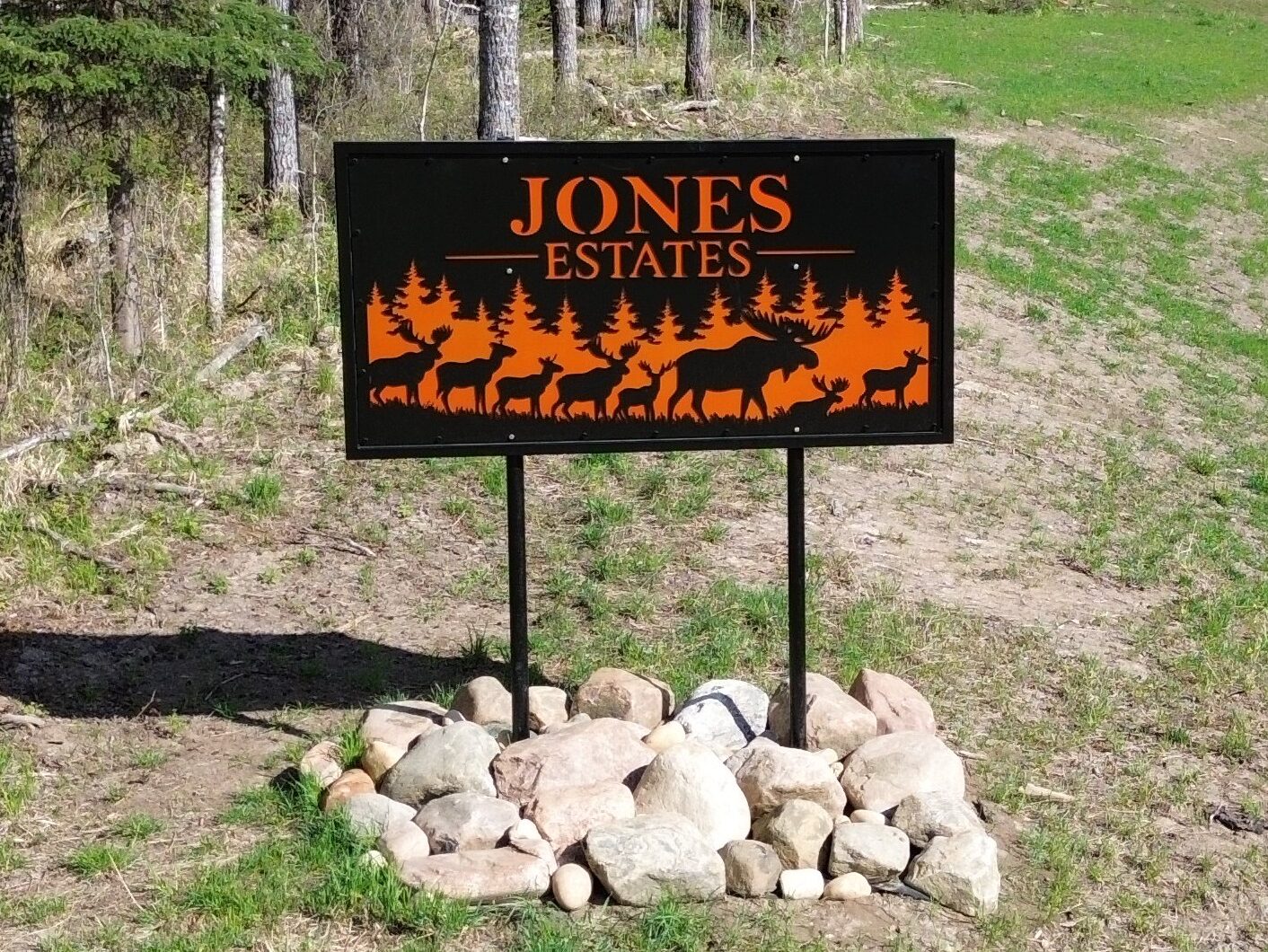 the sign at Jones Estates black metal with copper inlay